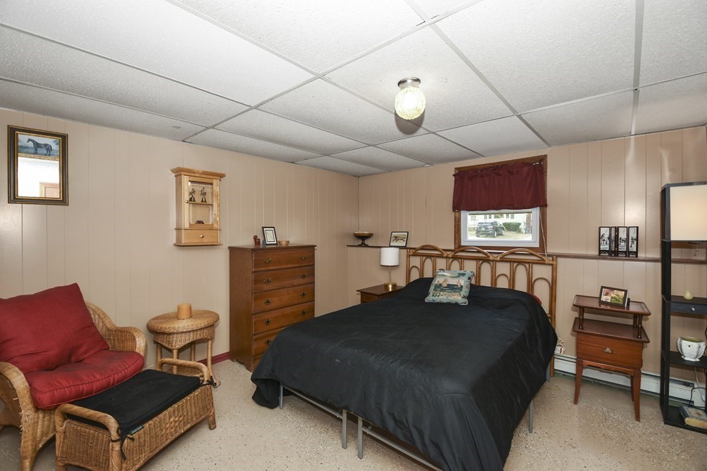 11 Hospital Road Templeton, MA 01436 - Photo 18 of 28 a bedroom with a bed and furniture