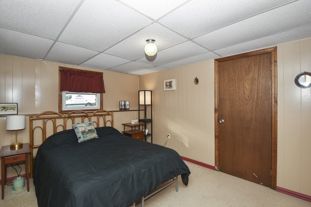 11 Hospital Road Templeton, MA 01436 - Photo 19 of 28 a bedroom with a bed and a window