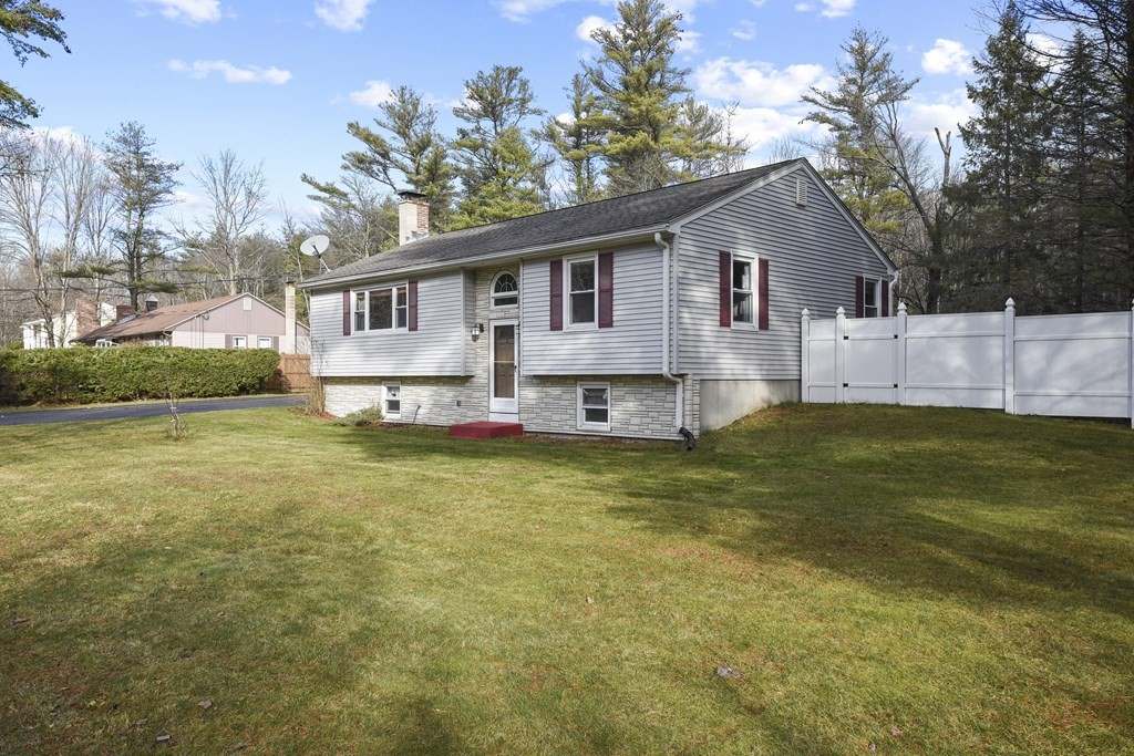 11 Hospital Road Templeton, MA 01436 - Photo 2 of 28 a front view of a house with a yard outdoor seating and garage