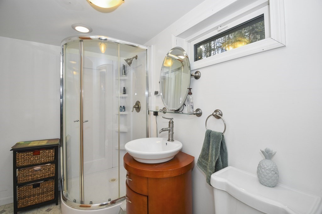 11 Hospital Road Templeton, MA 01436 - Photo 21 of 28 a bathroom with a sink a toilet and shower