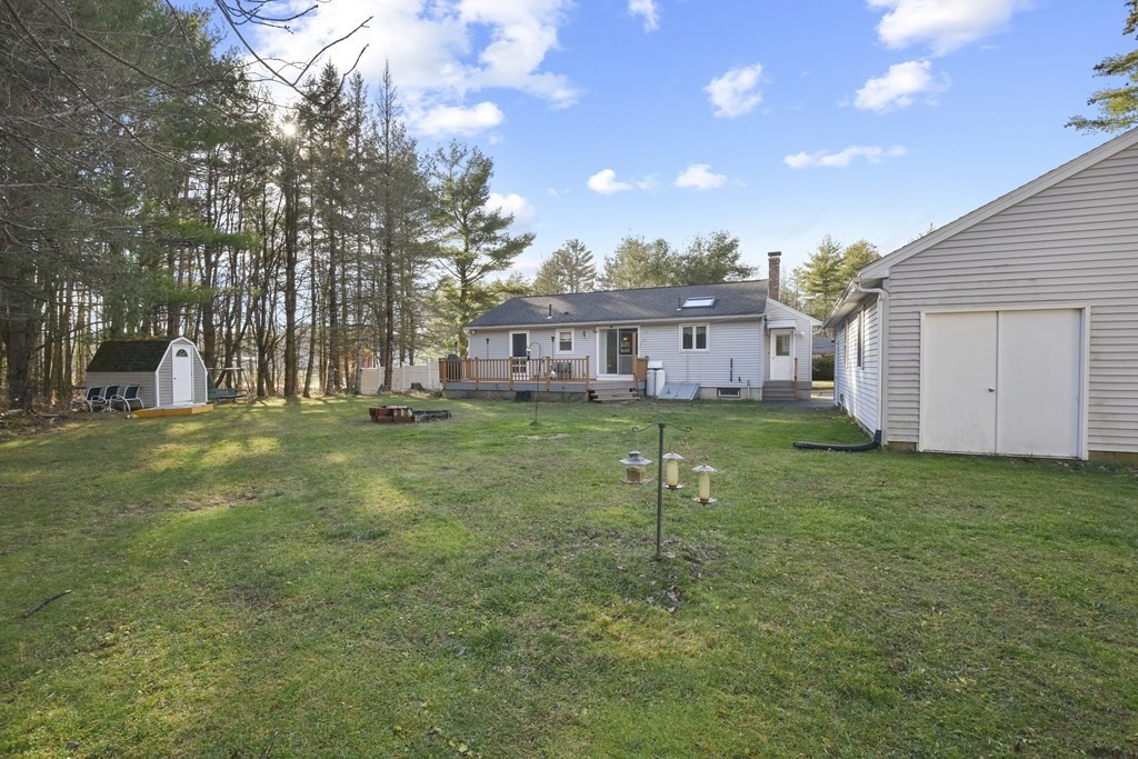 11 Hospital Road Templeton, MA 01436 - Photo 27 of 28 a house view with a play ground in front of it