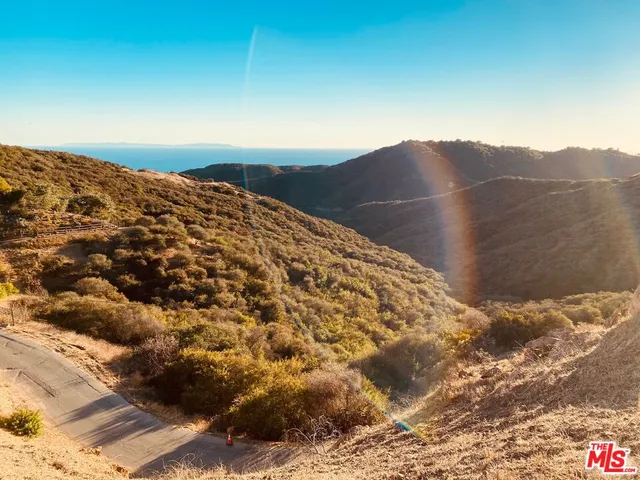 a view of a large window in a yard