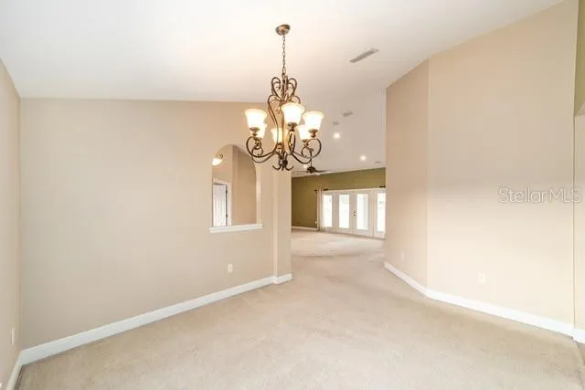a kitchen with a sink stove and refrigerator