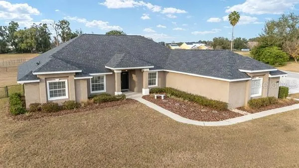 a house with trees in front of it