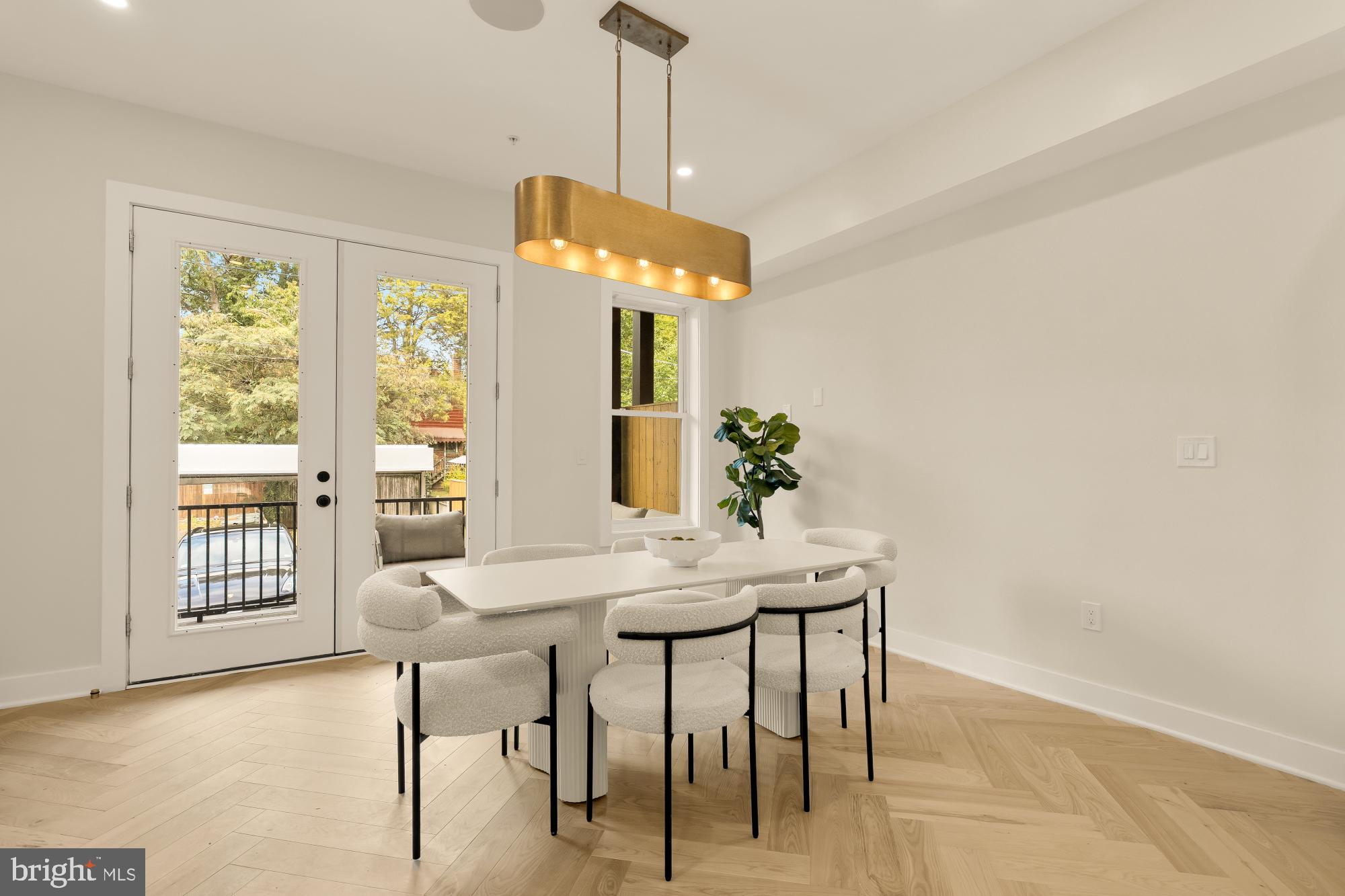 3703 Reservoir Road Northwest Washington, DC 20007 - Photo 19 of 60 a dining room with furniture and window