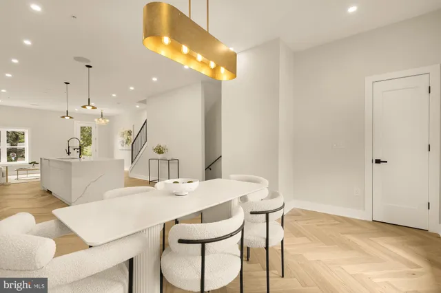 a bedroom with bed and a large window