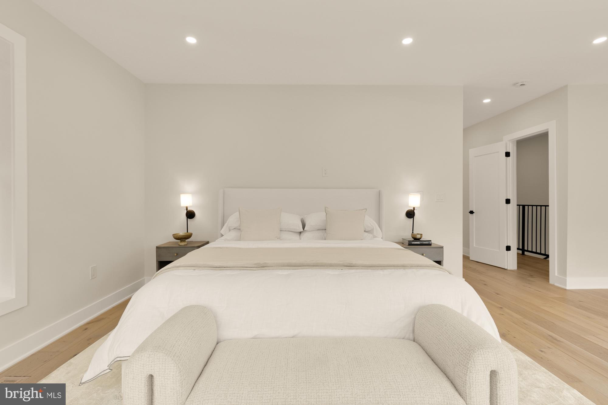 3703 Reservoir Road Northwest Washington, DC 20007 - Photo 26 of 60 a spacious bedroom with a bed and a walk in closet