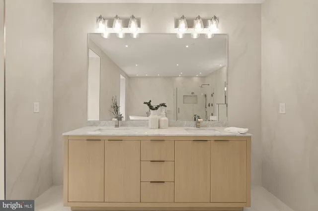 a view of a room that has a table and chairs in it