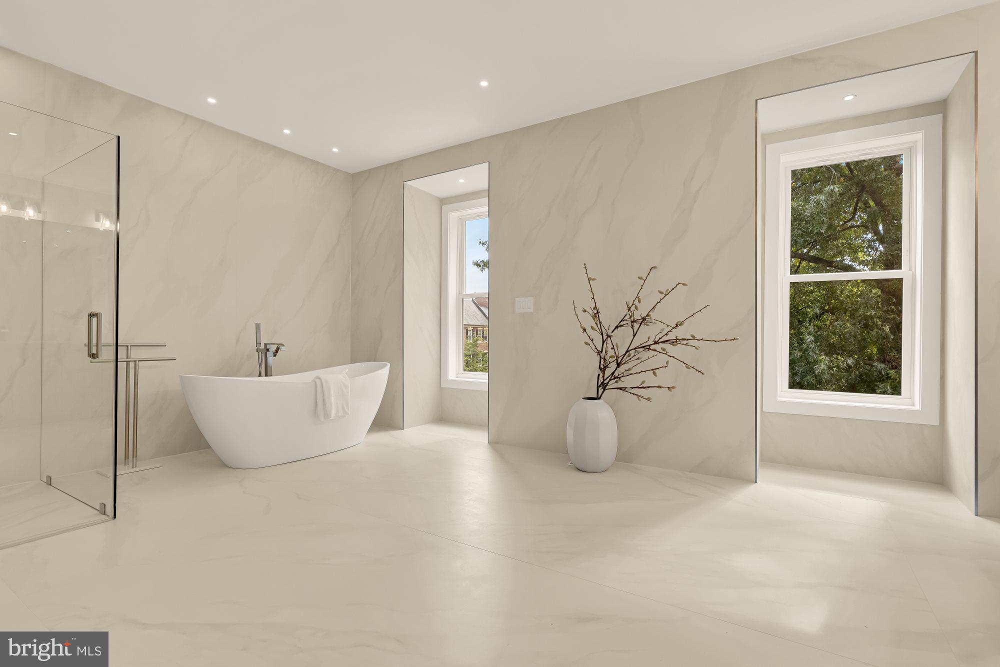 3703 Reservoir Road Northwest Washington, DC 20007 - Photo 33 of 60 a living room with furniture and a potted plant