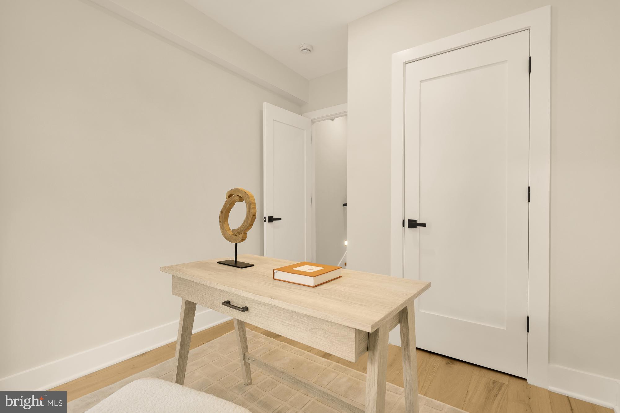 3703 Reservoir Road Northwest Washington, DC 20007 - Photo 39 of 60 a view of a room that has a table and chairs in it