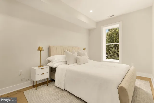 a view of a balcony with wooden floor