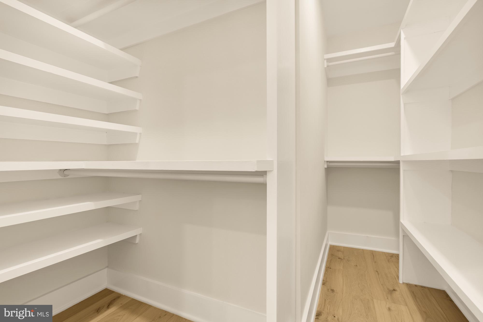 3703 Reservoir Road Northwest Washington, DC 20007 - Photo 42 of 60 a view of walk in closet with empty racks