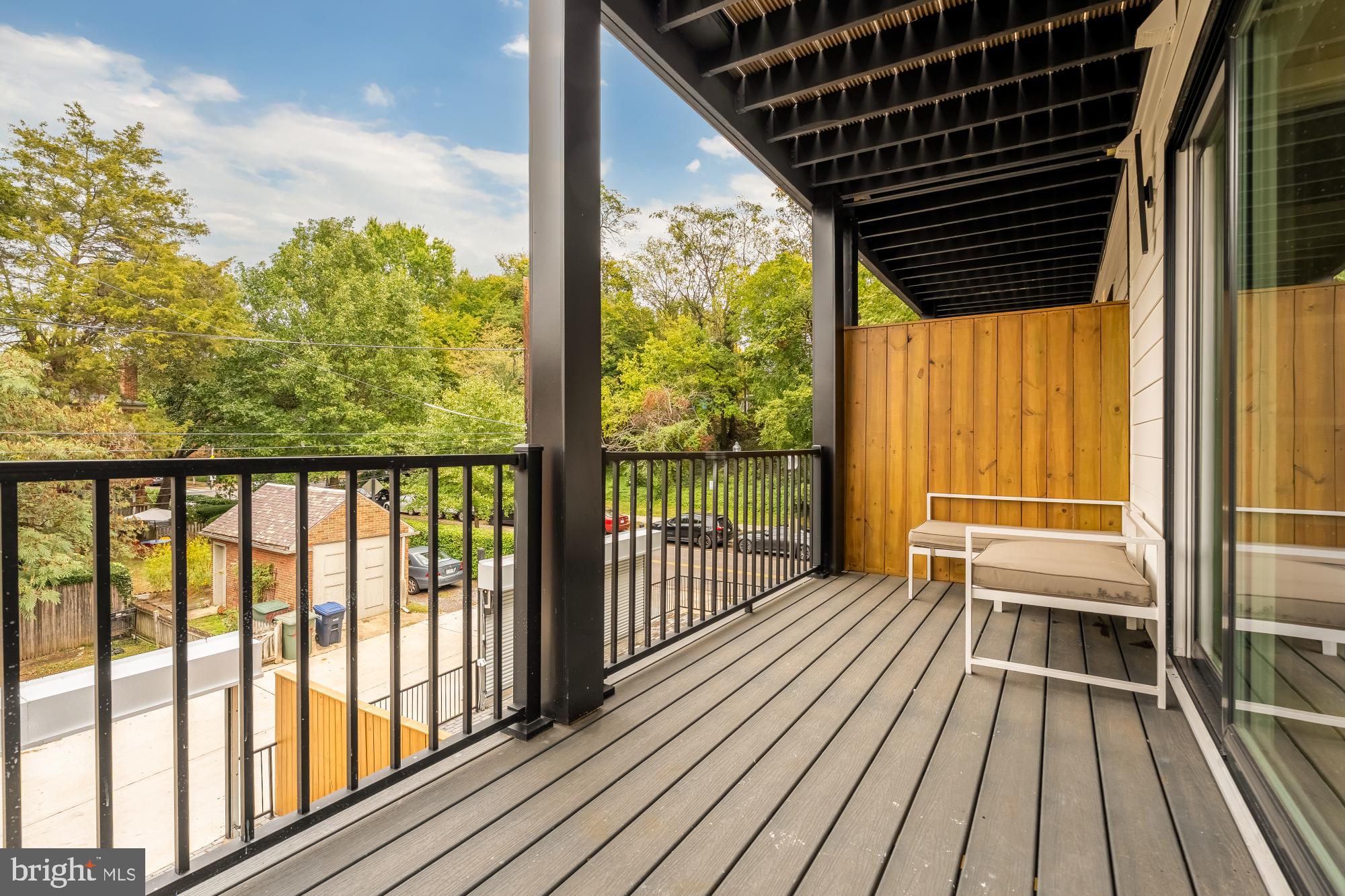 3703 Reservoir Road Northwest Washington, DC 20007 - Photo 48 of 60 a view of a balcony with wooden floor