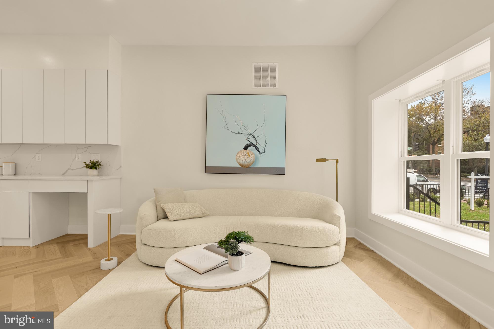 3703 Reservoir Road Northwest Washington, DC 20007 - Photo 5 of 60 a living room with furniture and a large window