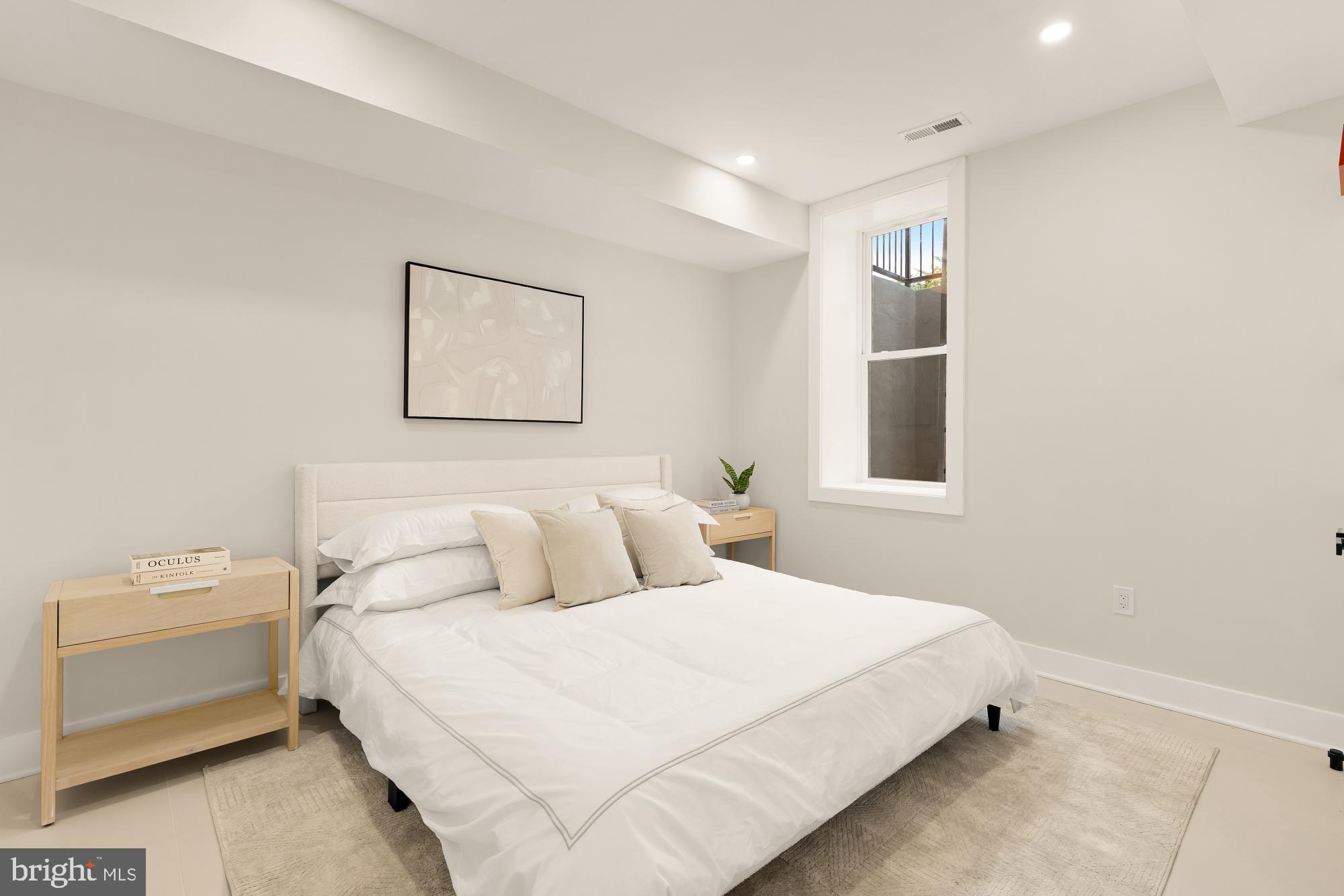 3703 Reservoir Road Northwest Washington, DC 20007 - Photo 55 of 60 a bedroom with a bed and a window