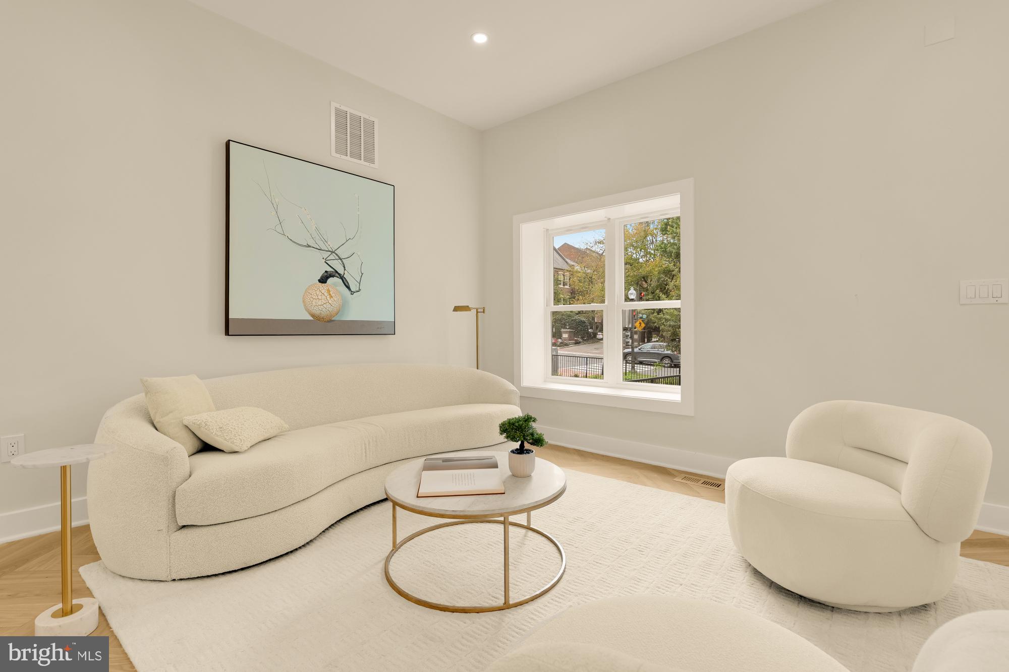 3703 Reservoir Road Northwest Washington, DC 20007 - Photo 7 of 60 a living room with furniture and a window