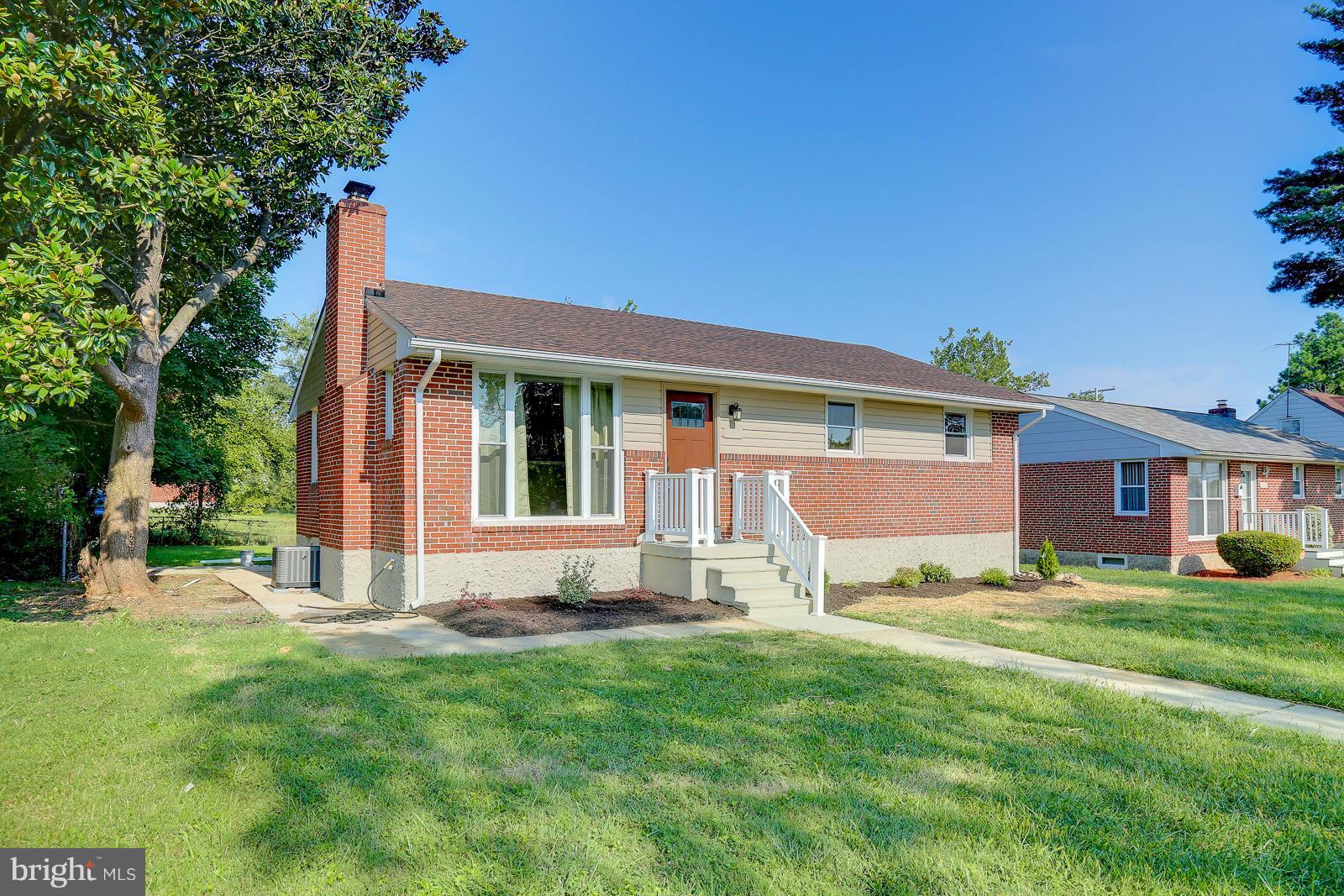3216 Mayfair Road Baltimore, MD 21207 - Photo 1 of 24 a view of a house with a yard