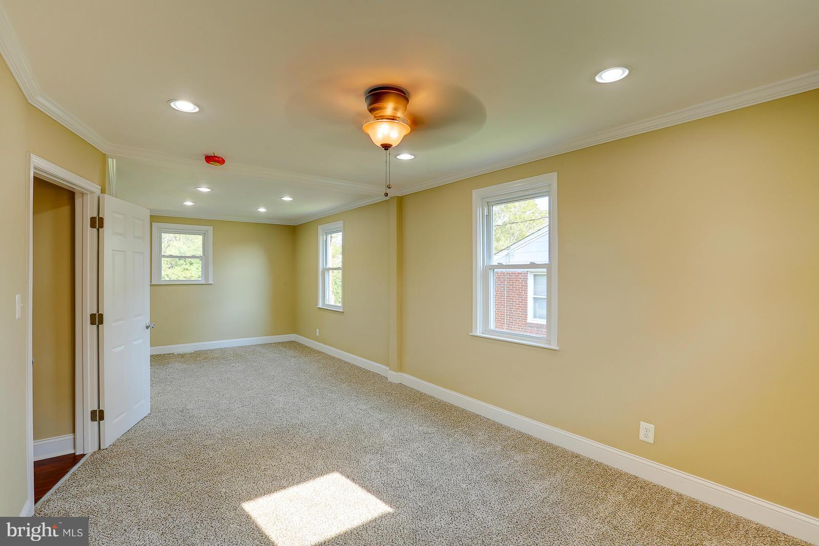3216 Mayfair Road Baltimore, MD 21207 - Photo 11 of 24 a view of an empty room with a window