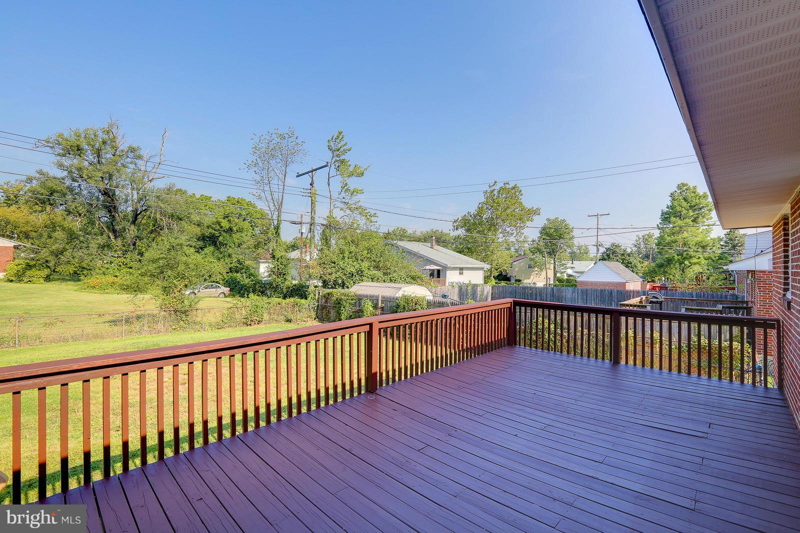 3216 Mayfair Road Baltimore, MD 21207 - Photo 22 of 24 a view of a balcony with wooden floor