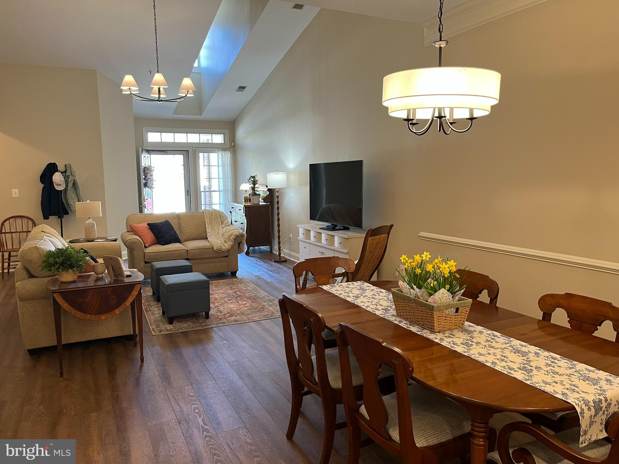 330 Colony Point Place Edgewater, MD 21037 - Photo 12 of 57 a view of a dining room with furniture wooden floor and chandelier