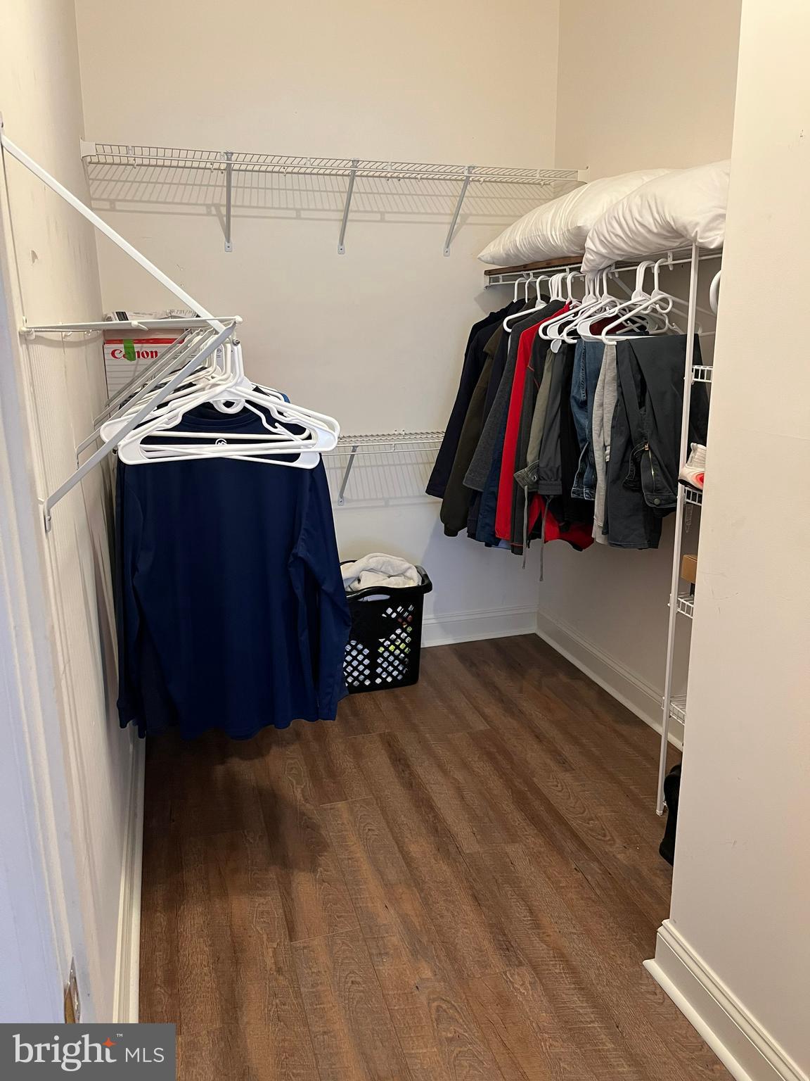 330 Colony Point Place Edgewater, MD 21037 - Photo 36 of 57 a view of walk in closet with clothes and shoes