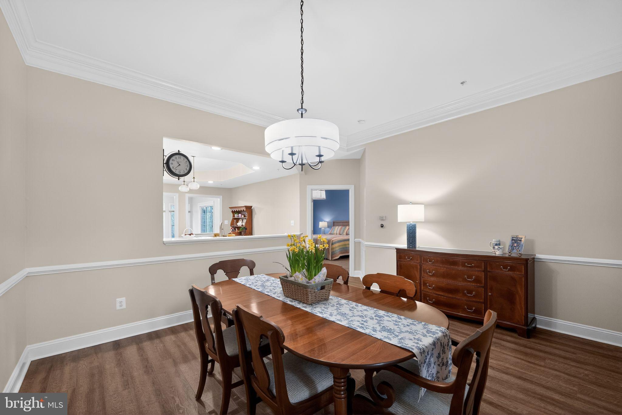 330 Colony Point Place Edgewater, MD 21037 - Photo 37 of 57 a view of a dining room with furniture and wooden floor