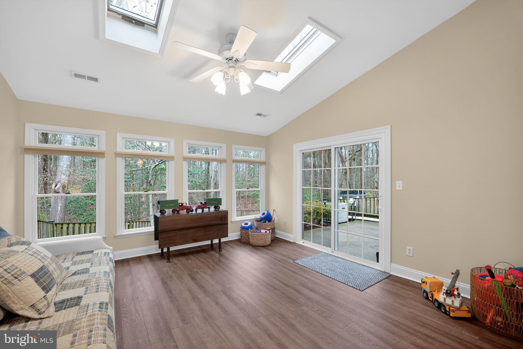 330 Colony Point Place Edgewater, MD 21037 - Photo 53 of 57 a living room with furniture and large windows