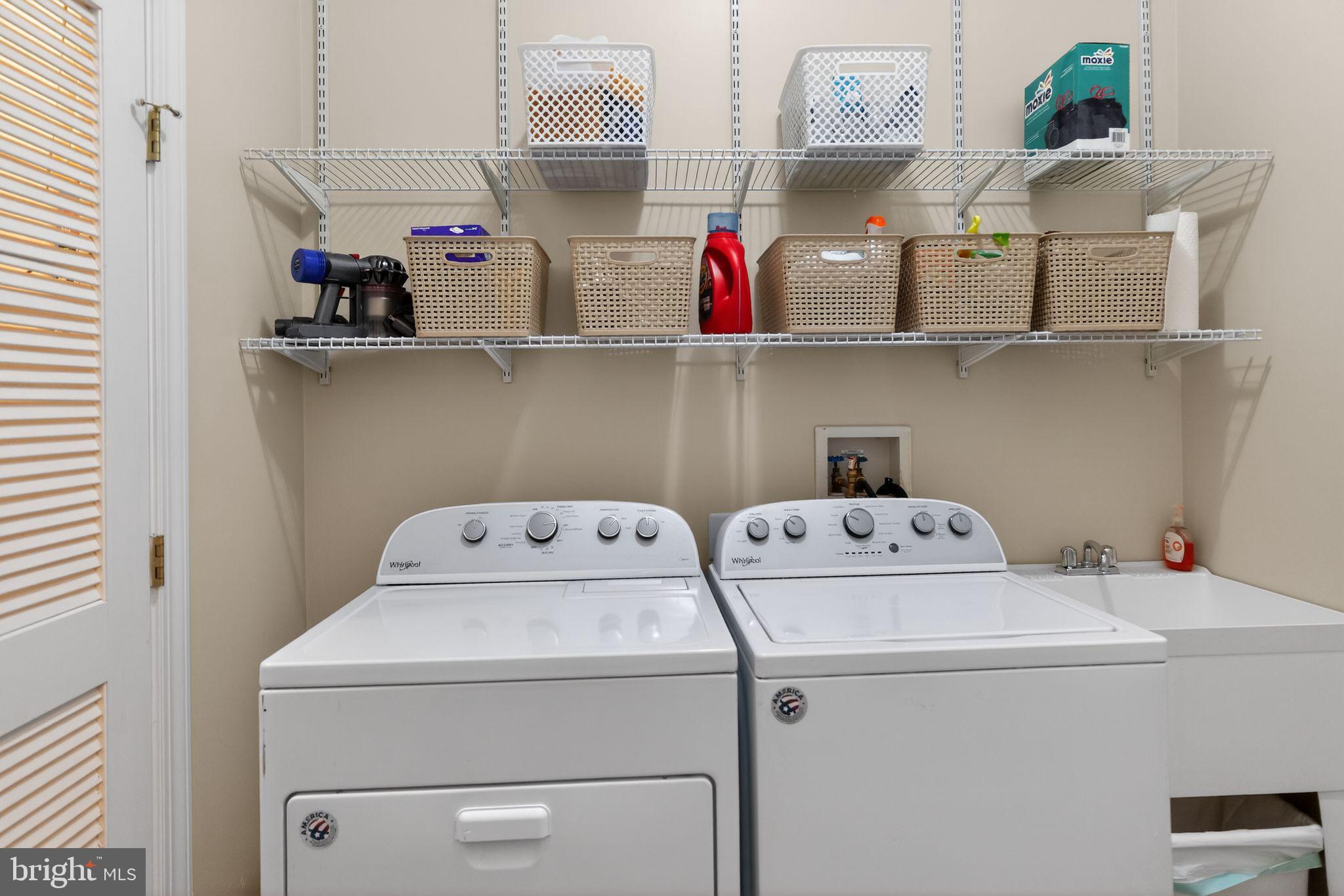 330 Colony Point Place Edgewater, MD 21037 - Photo 54 of 57 a utility room with dryer and washer