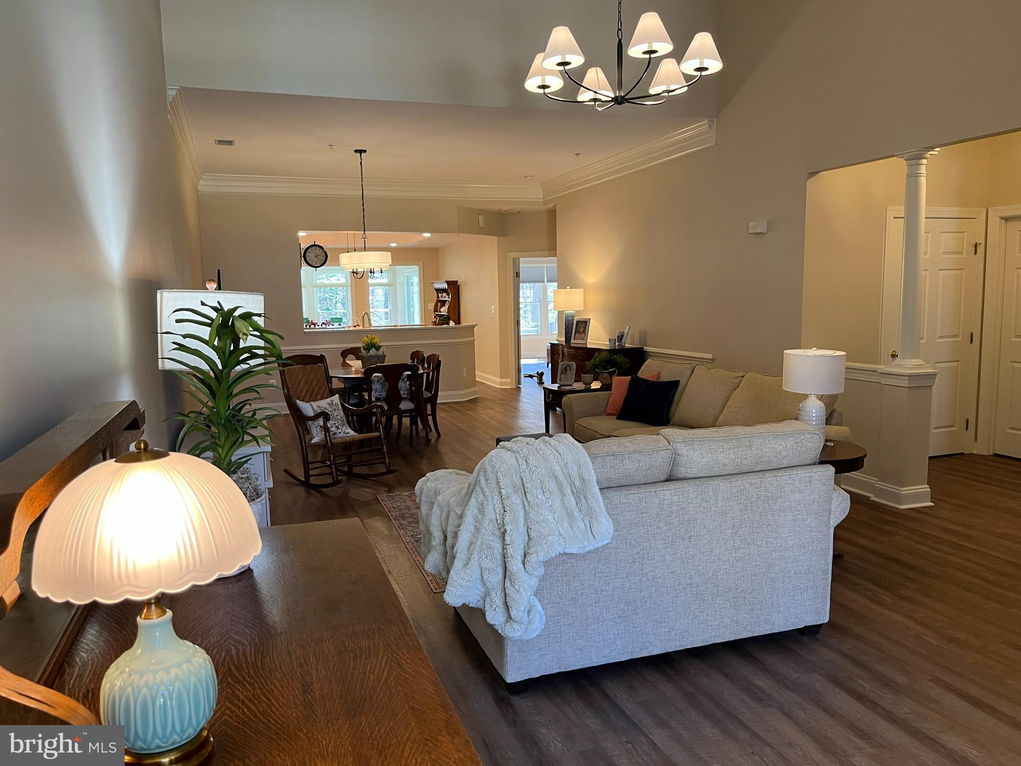 330 Colony Point Place Edgewater, MD 21037 - Photo 6 of 57 a living room with furniture and a chandelier