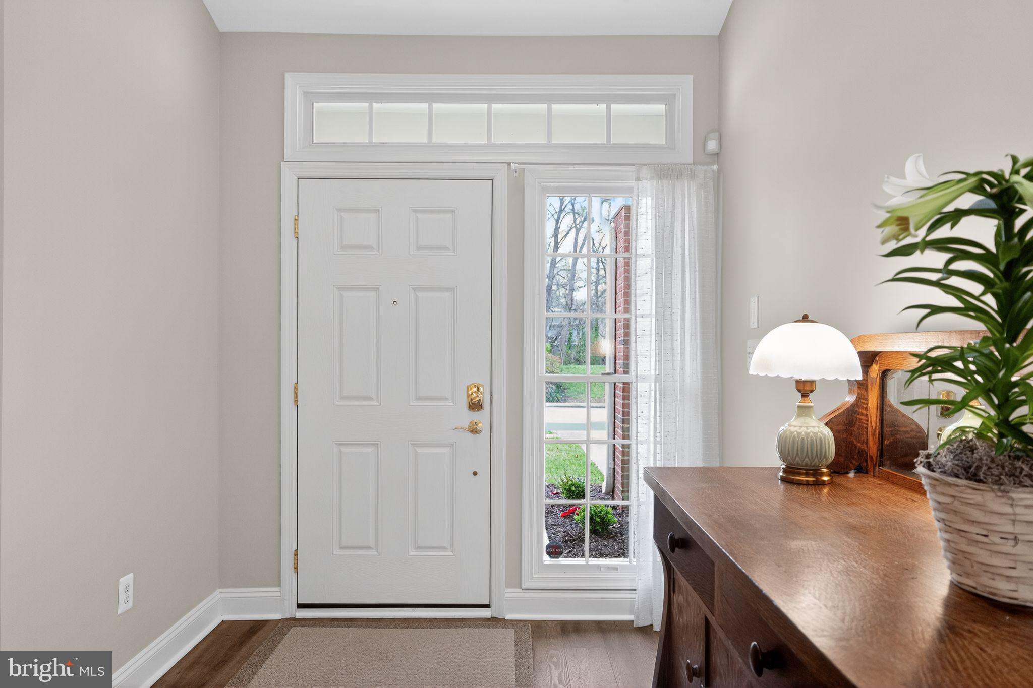 330 Colony Point Place Edgewater, MD 21037 - Photo 7 of 57 a view of a workspace with furniture and a window