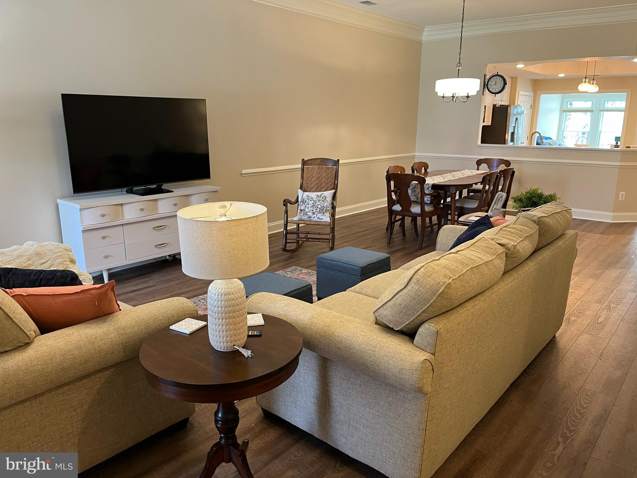 330 Colony Point Place Edgewater, MD 21037 - Photo 10 of 57 a living room with furniture and a flat screen tv