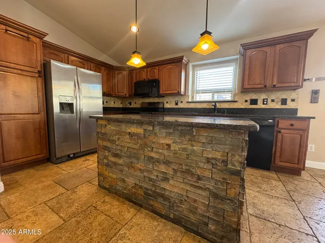 a view of a livingroom with wooden floor