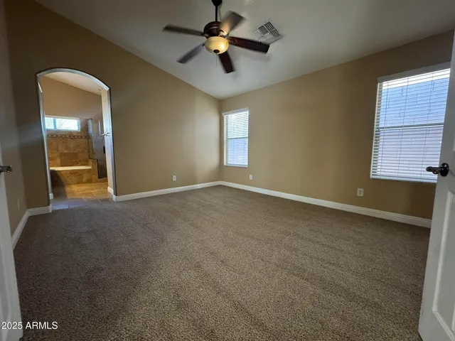 a bathroom with a bathtub and a sink