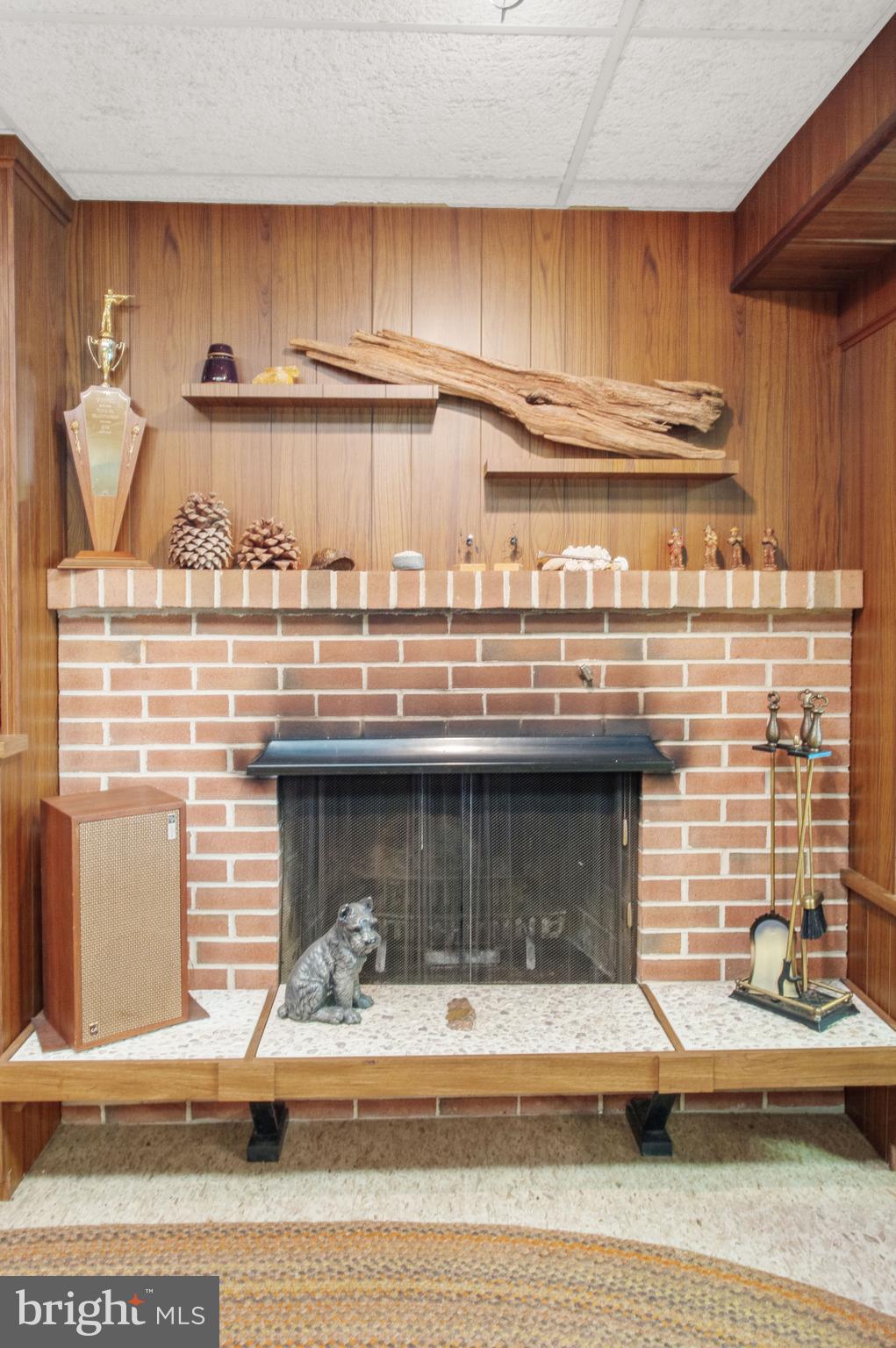 469 Highland Road Red Lion, PA 17356 - Photo 31 of 36 Recreation room fireplace