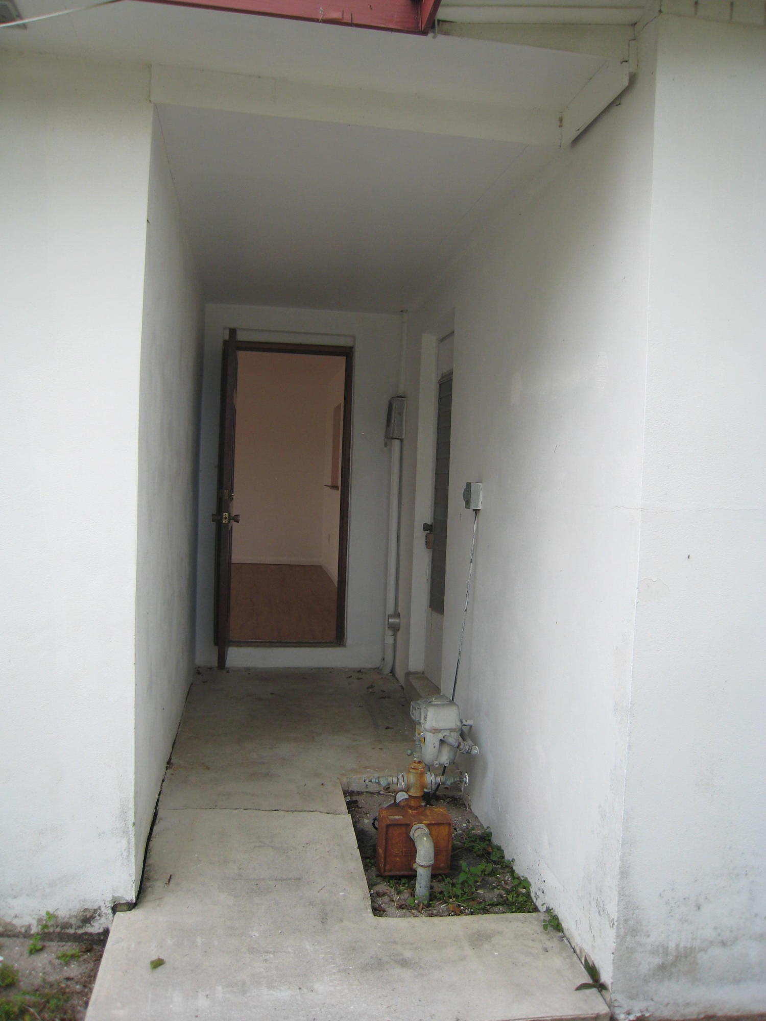 321 Masters Road Lake Worth, FL 33461 - Photo 20 of 21 Side entry and Laundry Room entry