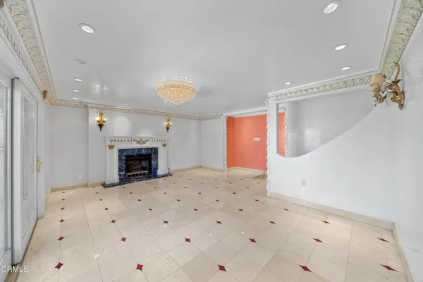 a view of a livingroom with kitchen