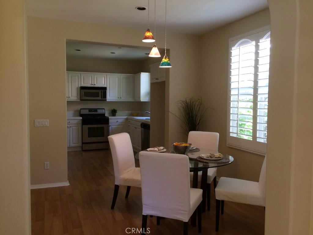 122 Reunion Irvine, CA 92603 - Photo 3 of 13 a dining room with furniture and window
