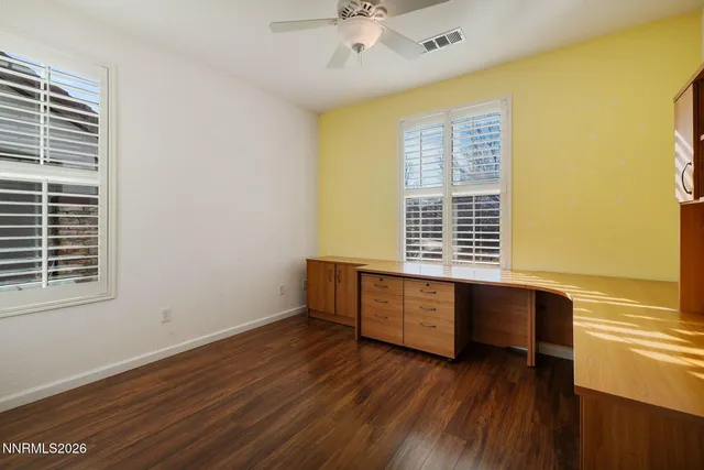 a view of workspace with wooden floor