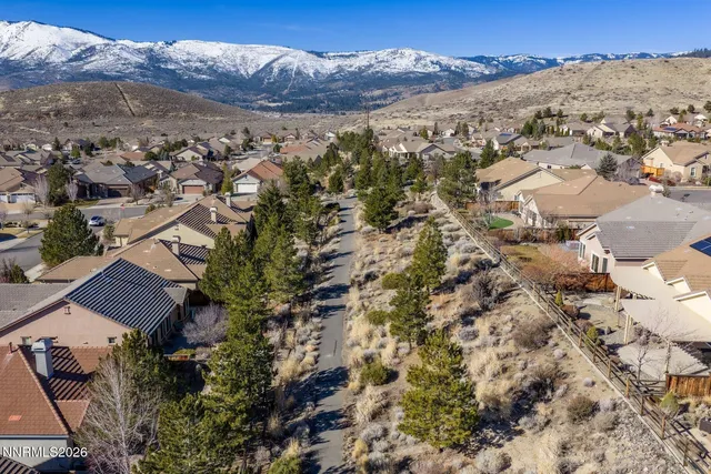 an aerial view of residential house with outdoor space
