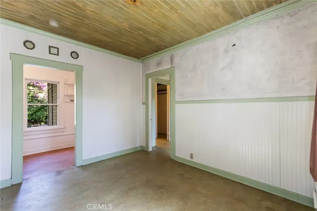 a view of a hallway with closet