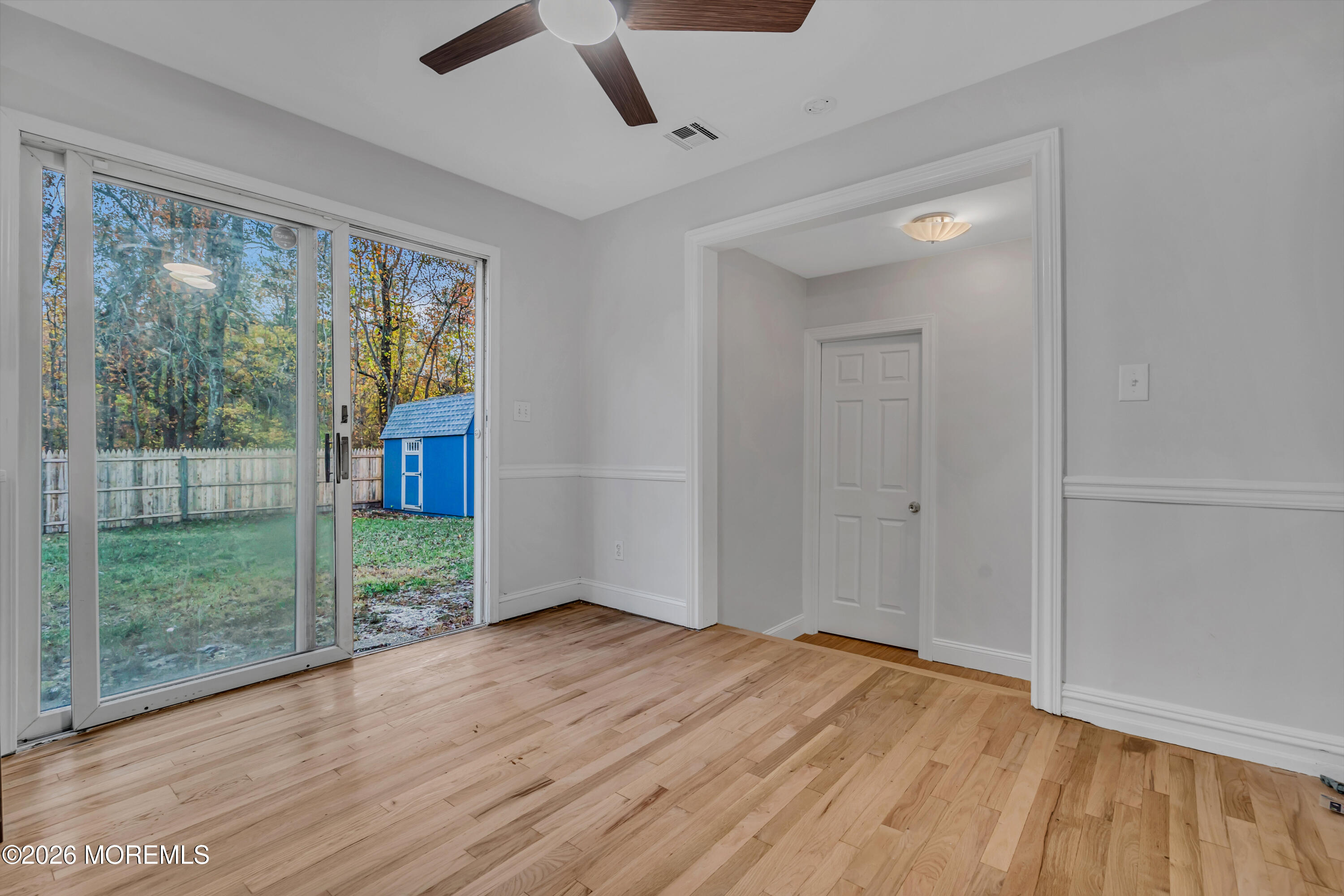 20 Jeanette Street Bayville, NJ 08721 - Photo 12 of 28 a view of empty room with wooden floor and fan