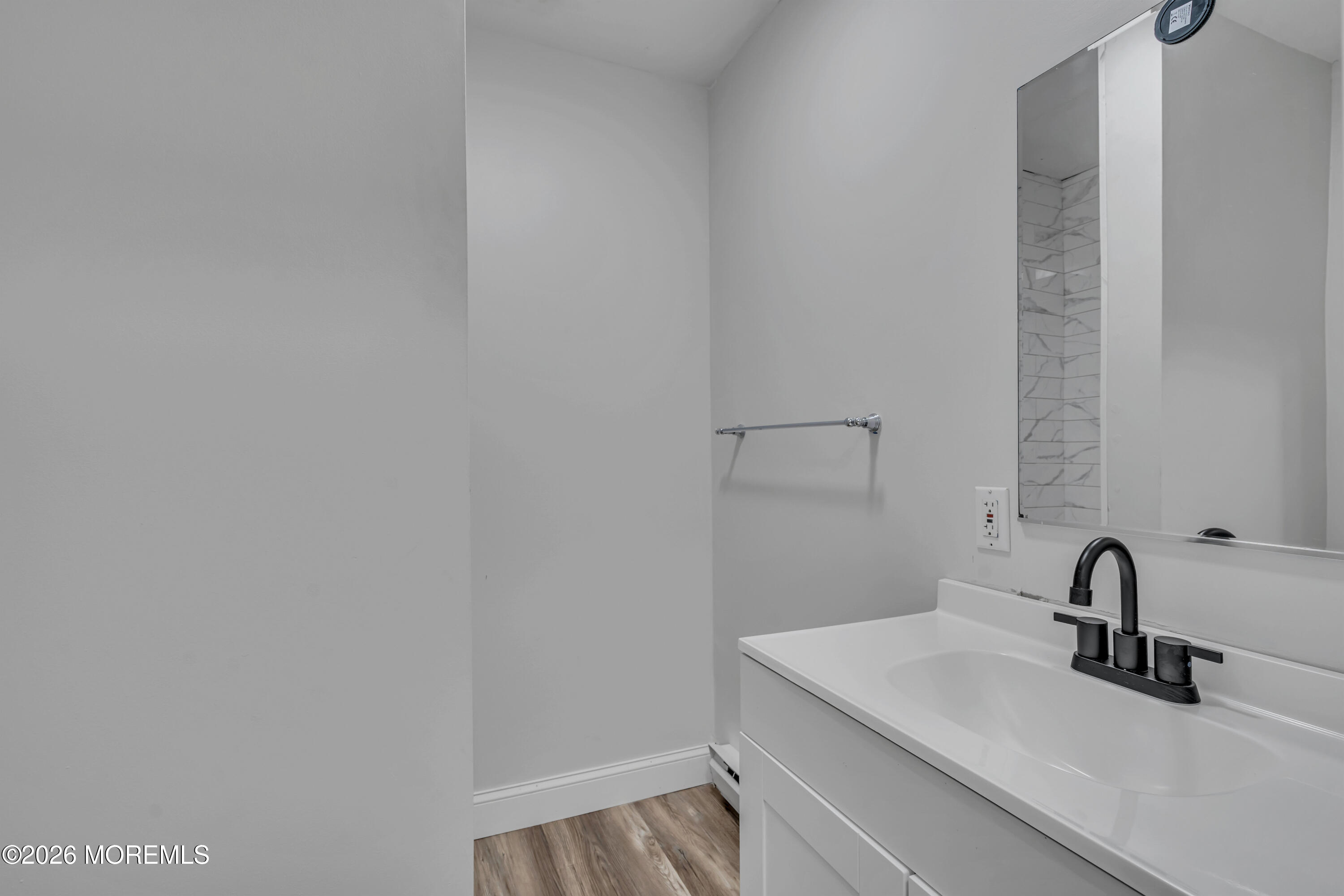 20 Jeanette Street Bayville, NJ 08721 - Photo 21 of 28 a bathroom with a sink and vanity