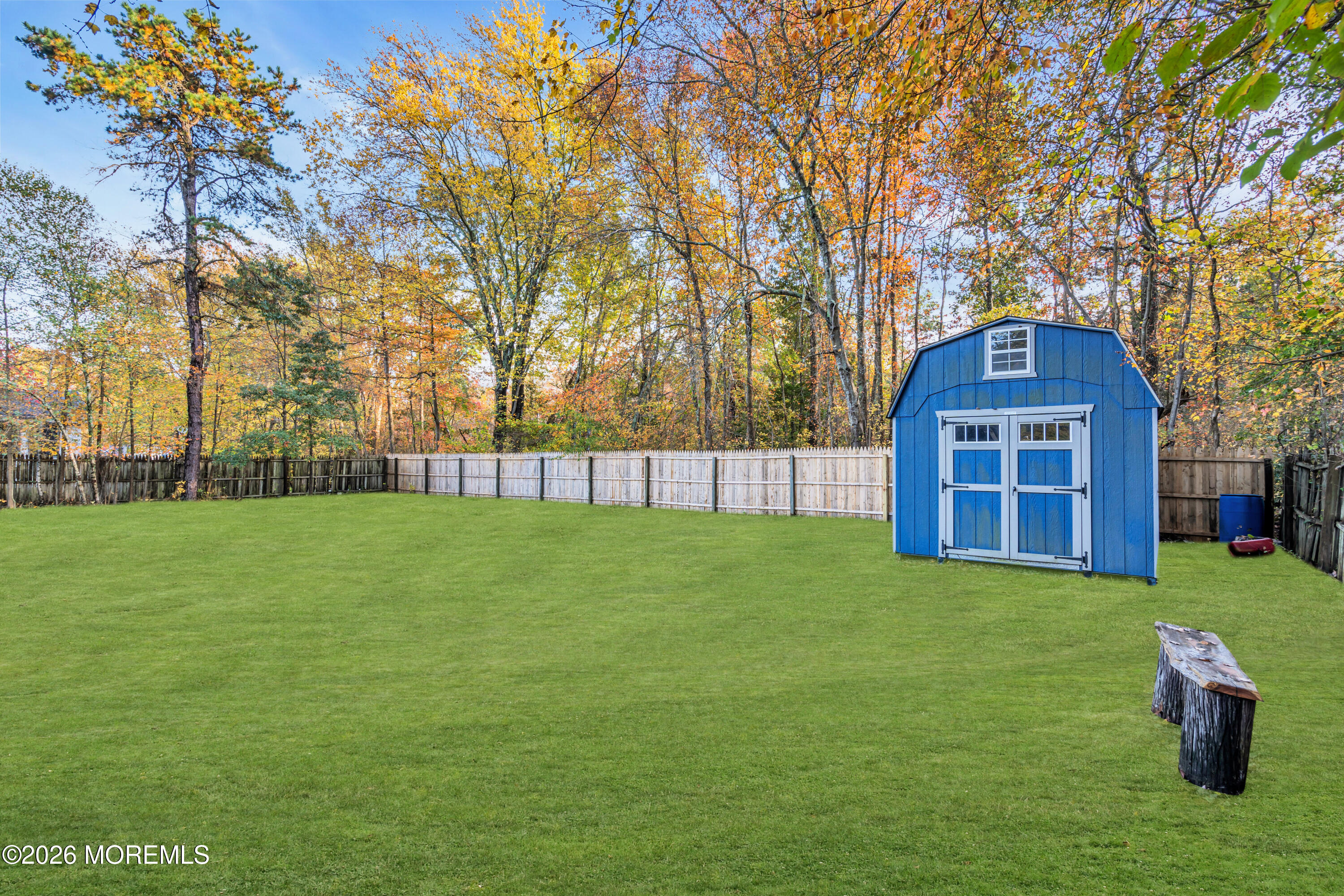 20 Jeanette Street Bayville, NJ 08721 - Photo 27 of 28 a view of a garden with a fountain