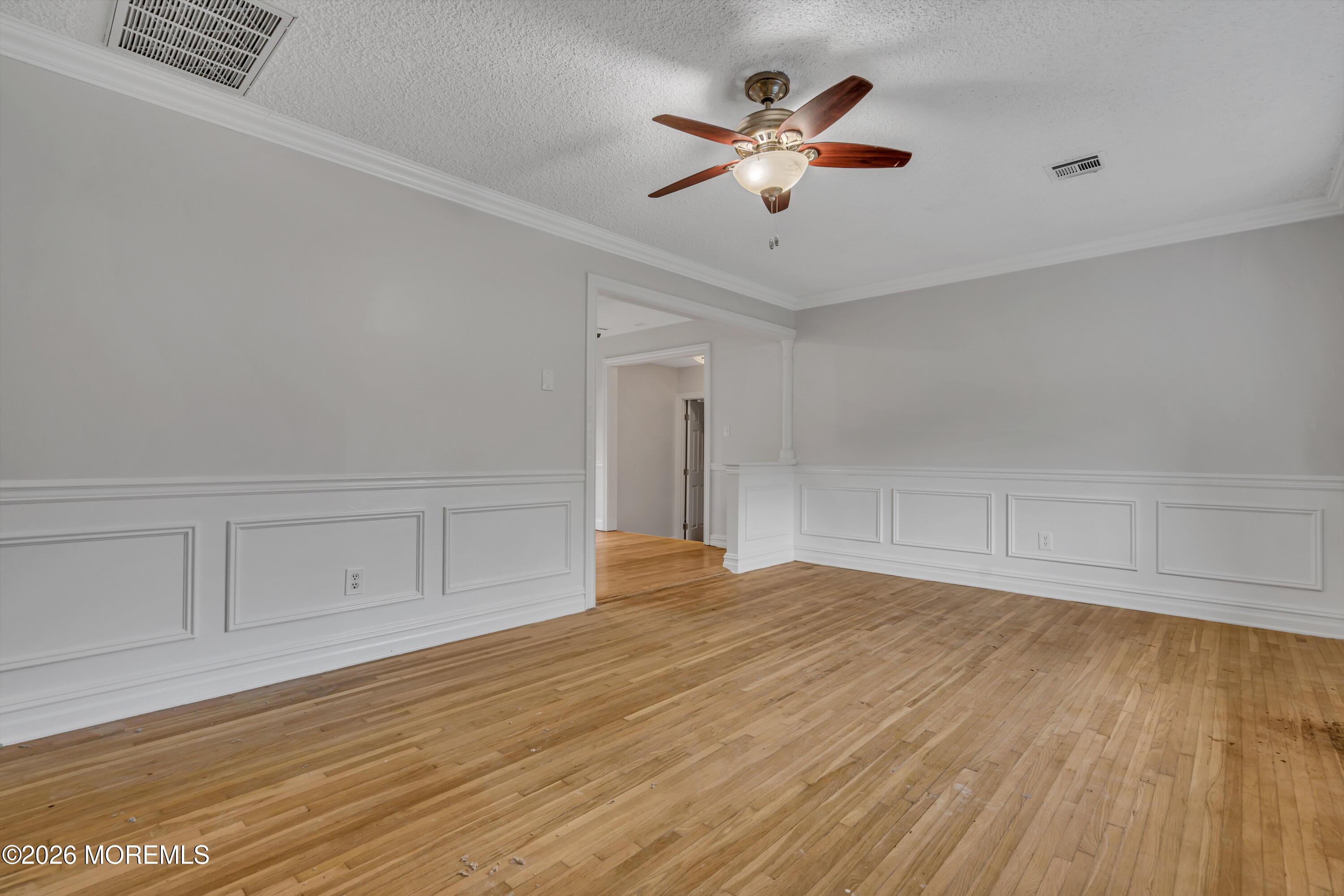 20 Jeanette Street Bayville, NJ 08721 - Photo 4 of 28 wooden floor in an empty room