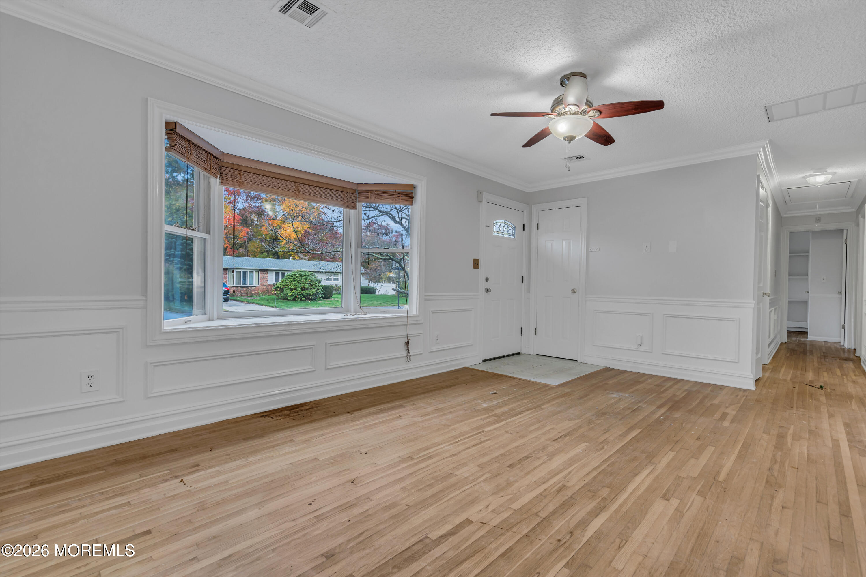 20 Jeanette Street Bayville, NJ 08721 - Photo 5 of 28 wooden floor in an empty room with a window
