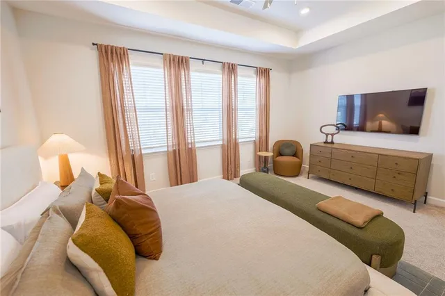 a bathroom with a sink a mirror and a shower