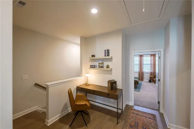 a bathroom with a double vanity sink mirror and shower