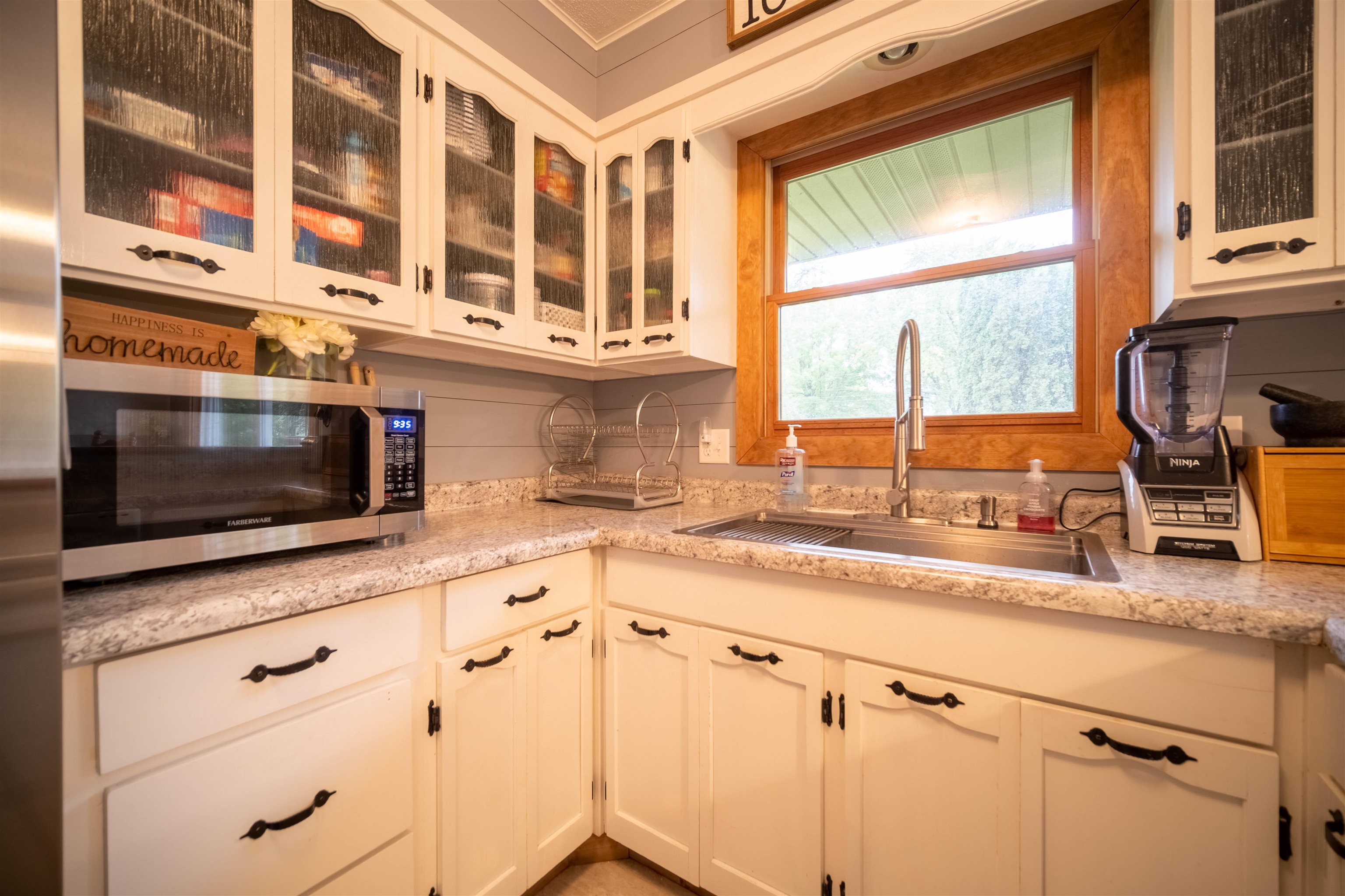 230 Swanson Road Sycamore, IL 60178 - Photo 14 of 42 a kitchen with stainless steel appliances a sink a stove and cabinets