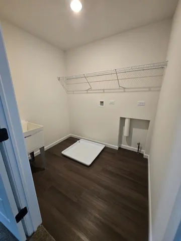 a view of a room with racks on the wall