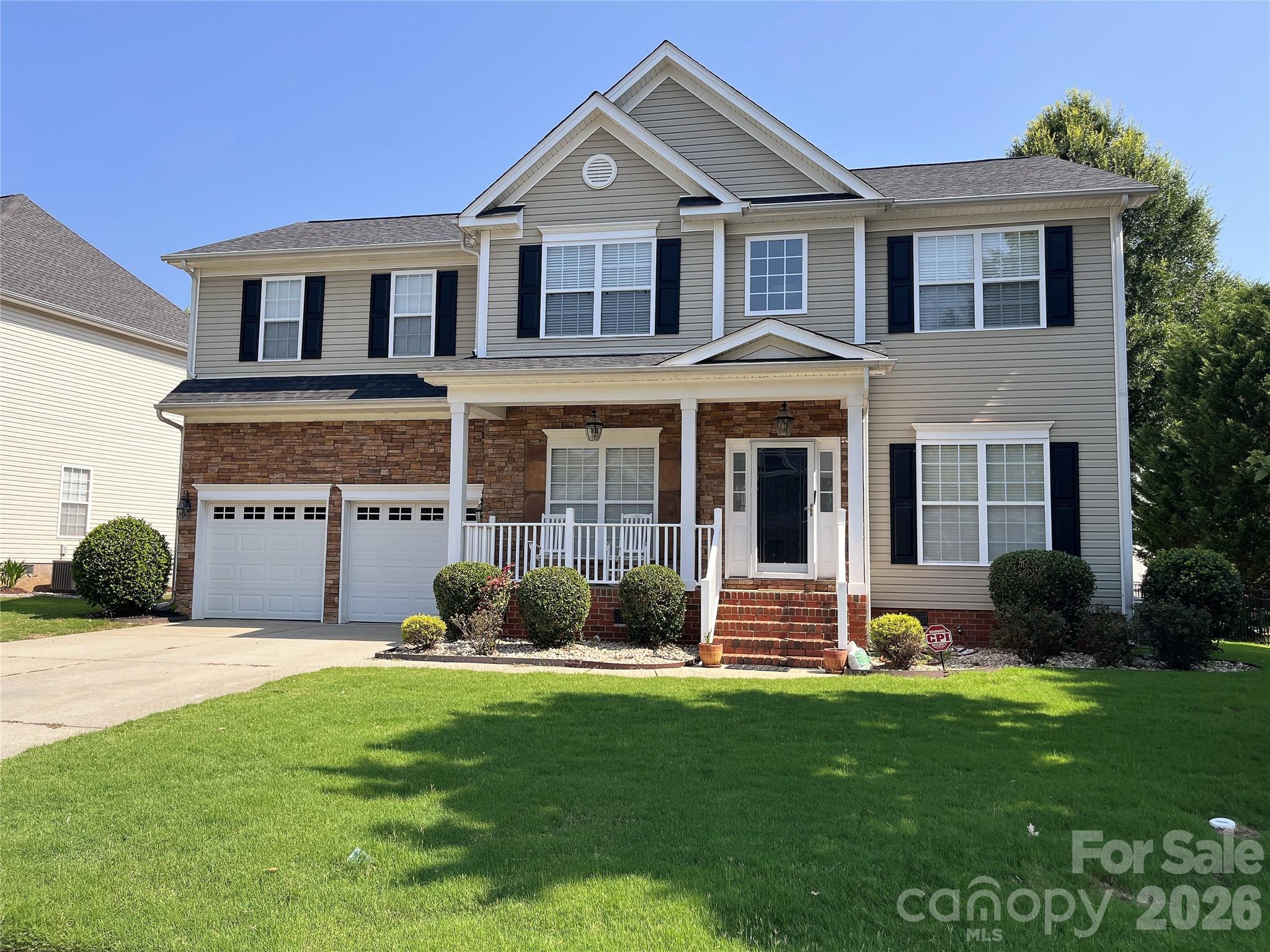 509 Evening Mist Drive Fort Mill, SC 29708 - Photo 1 of 48 a front view of a house with a yard